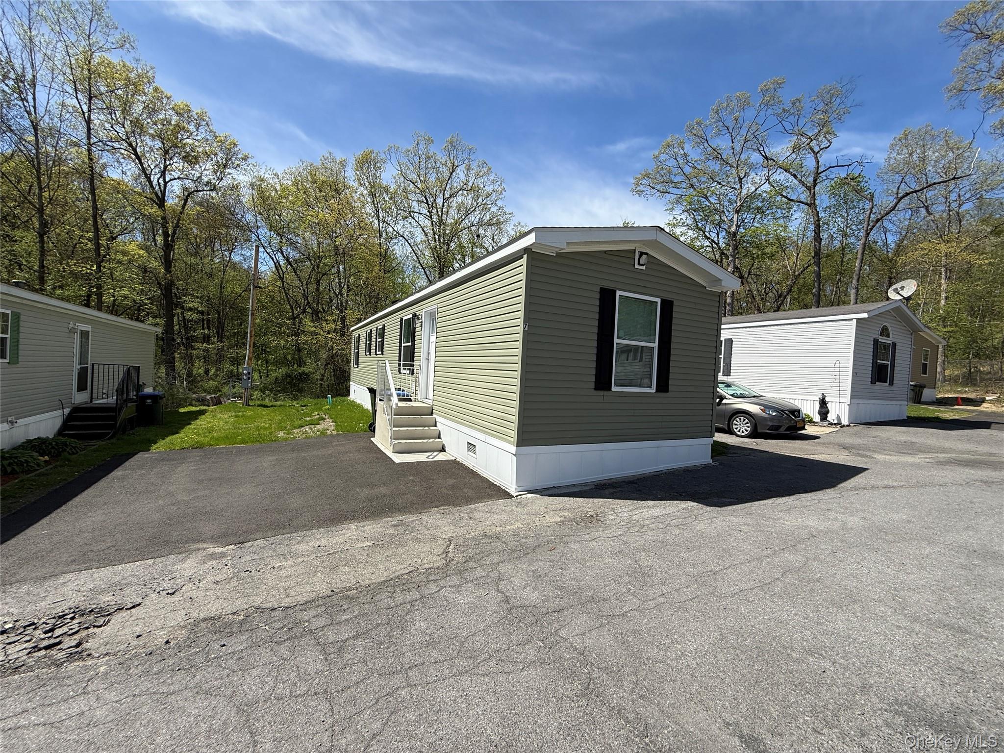 3146 Rte 9W, Unit 8A New Windsor, NY 12553 - Photo 1 of 14 a view of backyard of house and car parked