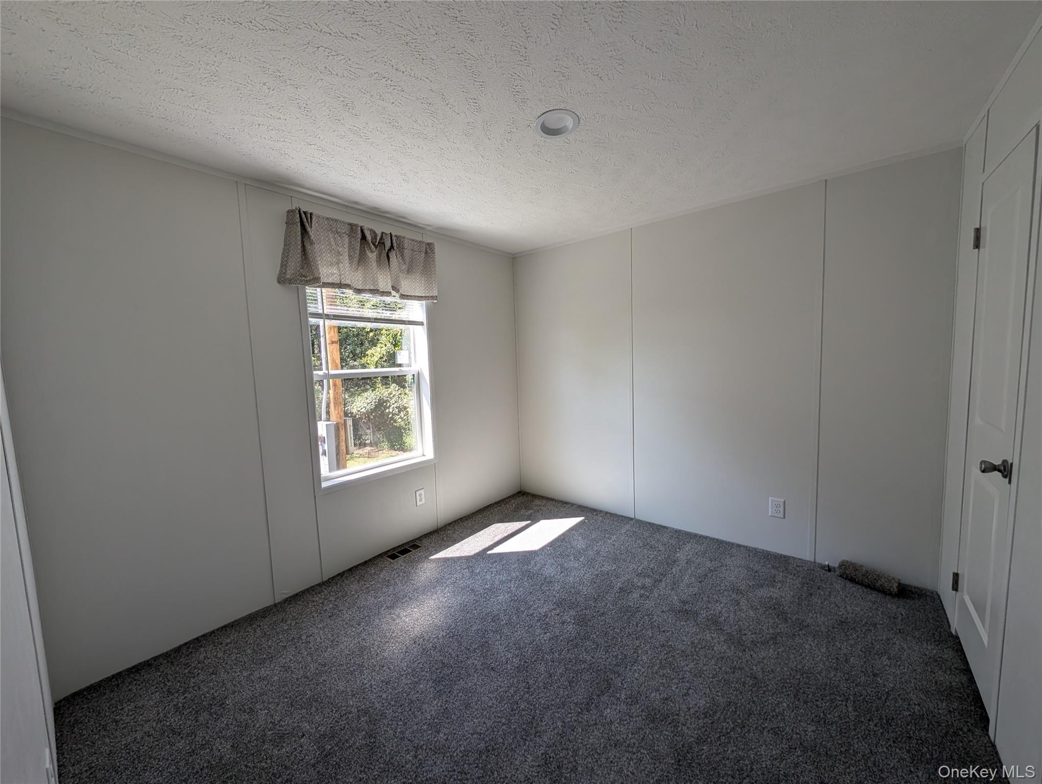 3146 Rte 9W, Unit 8A New Windsor, NY 12553 - Photo 13 of 14 an empty room with windows