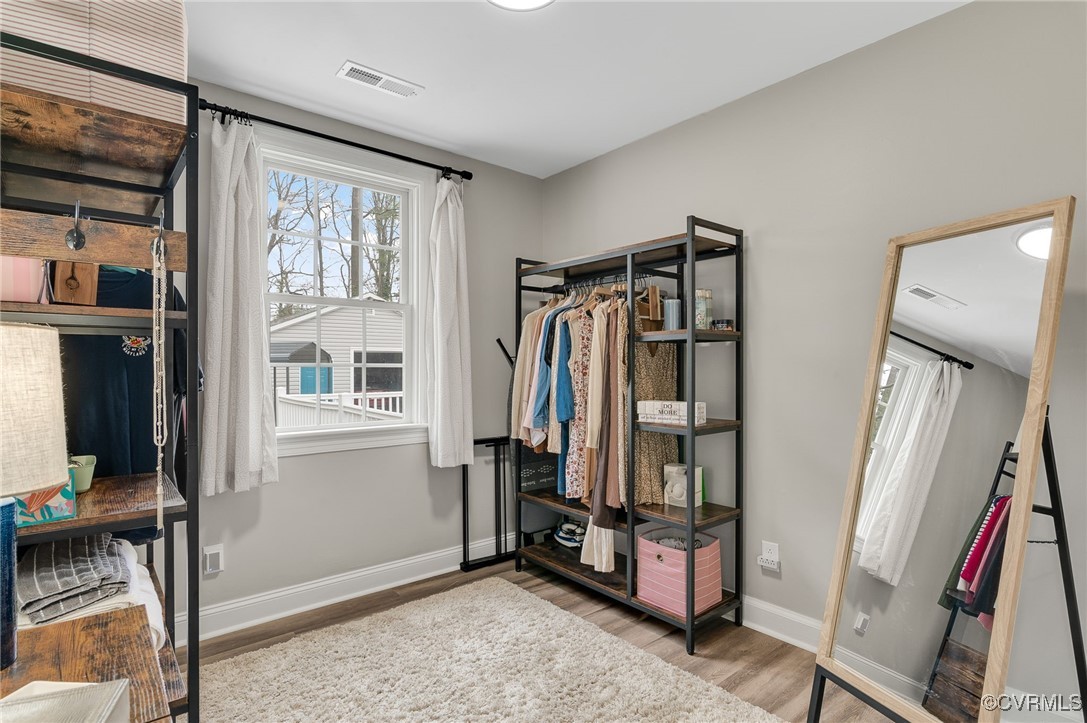 206 West McClellan Street Sandston, VA 23150 - Photo 14 of 24 a view of walk in closet with clothes and shoes