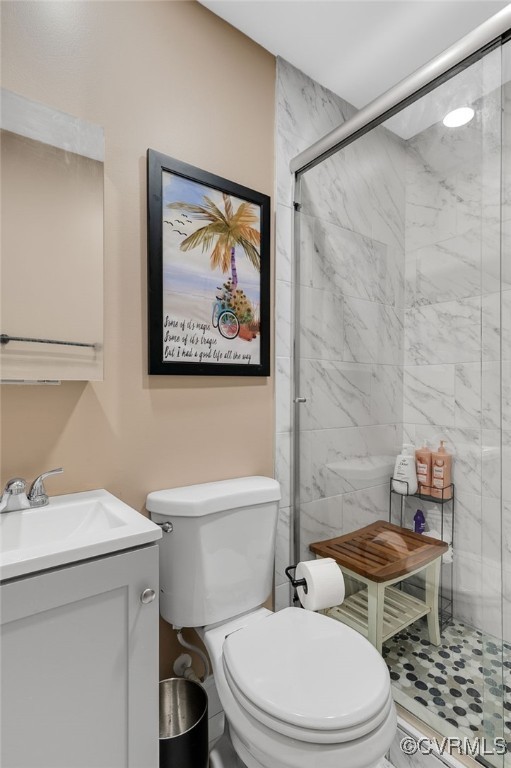 206 West McClellan Street Sandston, VA 23150 - Photo 15 of 24 a white toilet sitting next to a bathroom sink