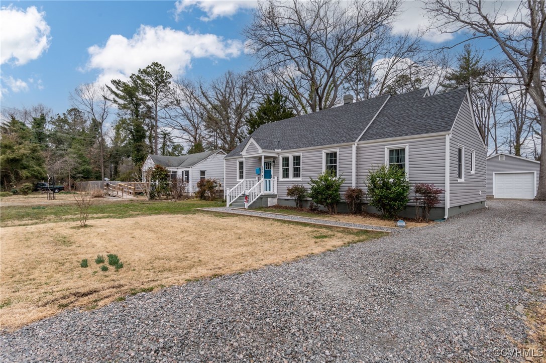 206 West McClellan Street Sandston, VA 23150 - Photo 2 of 24 a house with trees in front of it