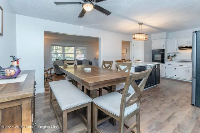 a view of a dining room with furniture