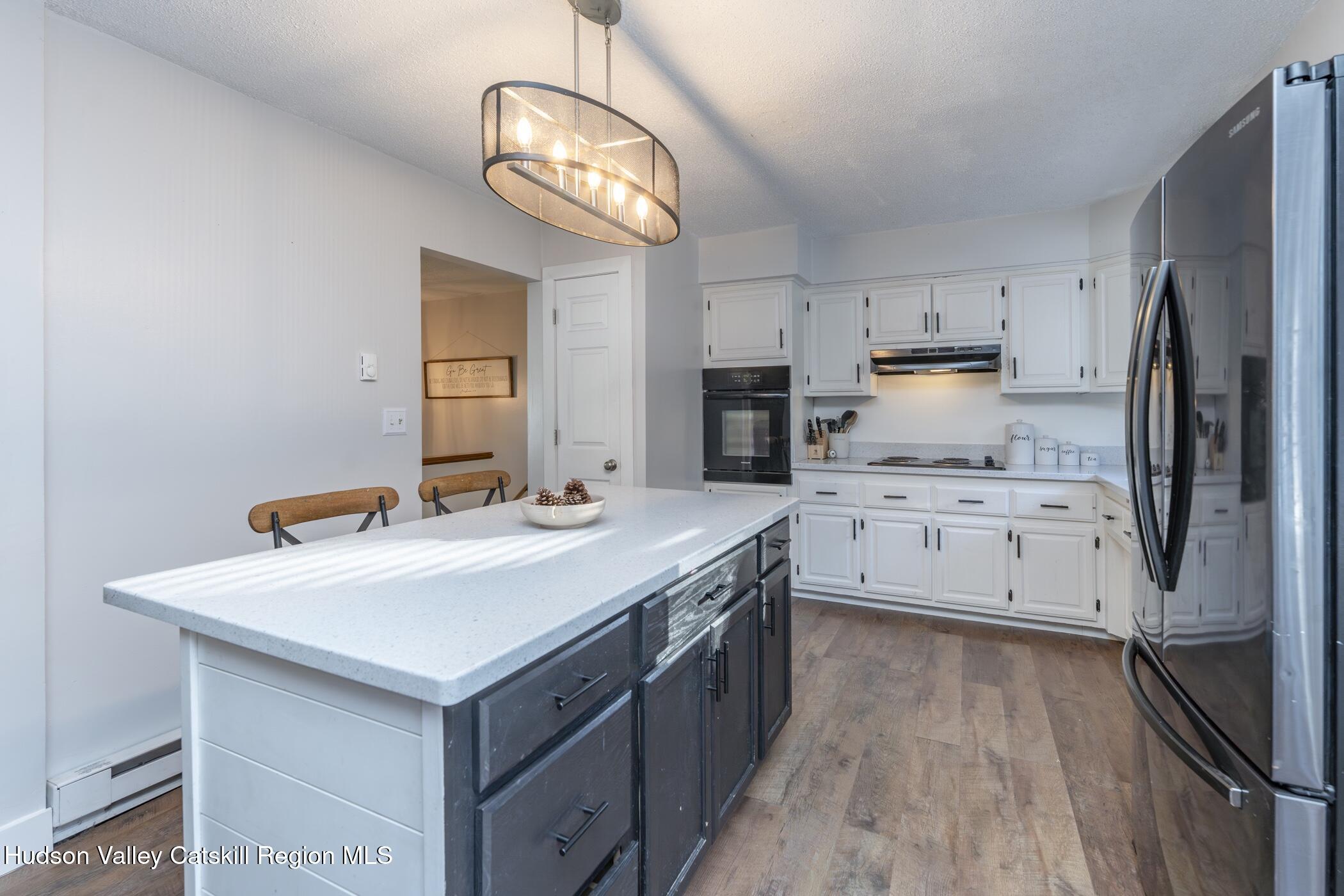 30 Willow Road Saugerties, NY 12477 - Photo 13 of 40 a kitchen with a sink stainless steel appliances a counter top space and cabinets