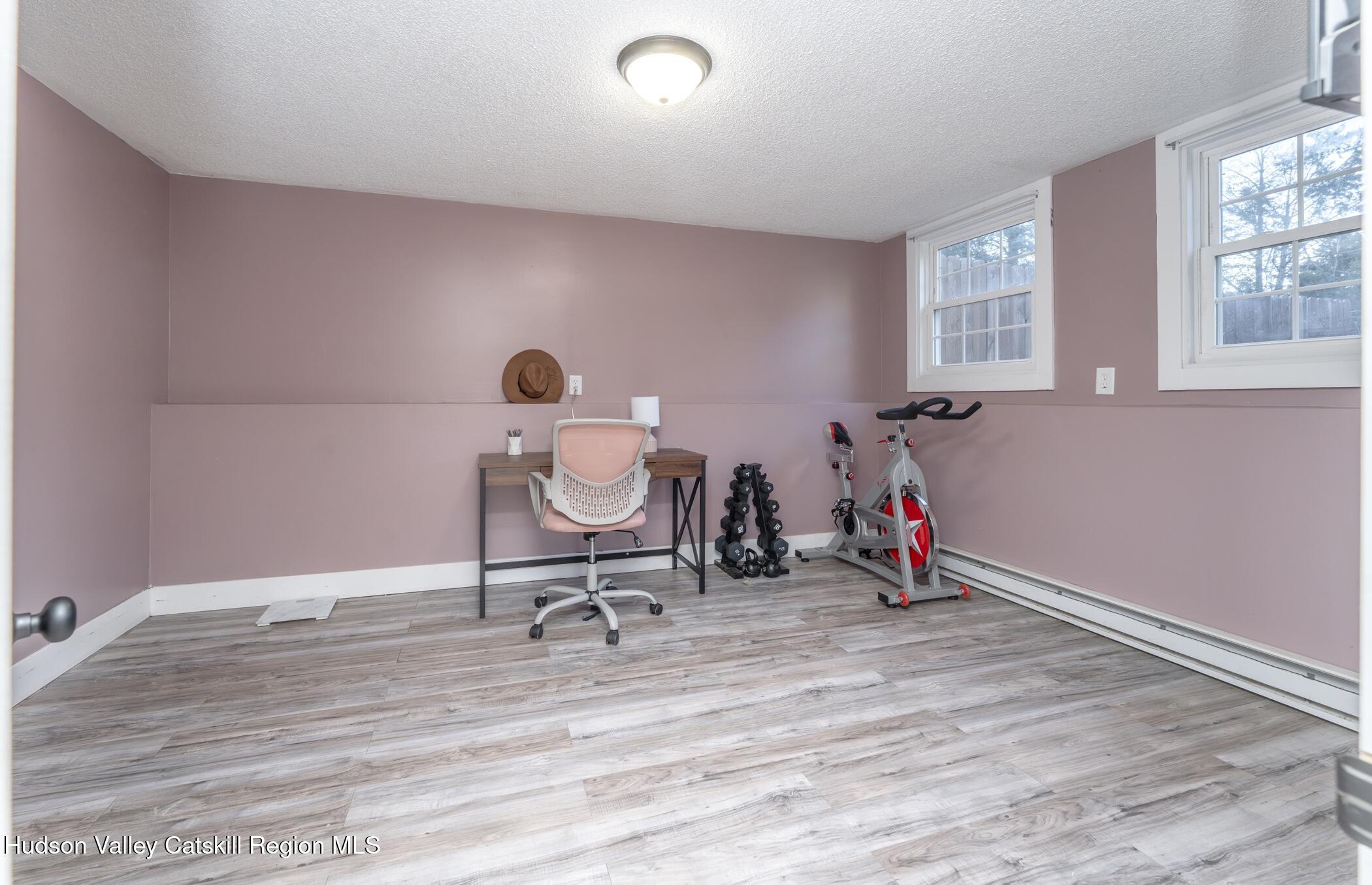 30 Willow Road Saugerties, NY 12477 - Photo 26 of 40 a view of a workspace with furniture and a window