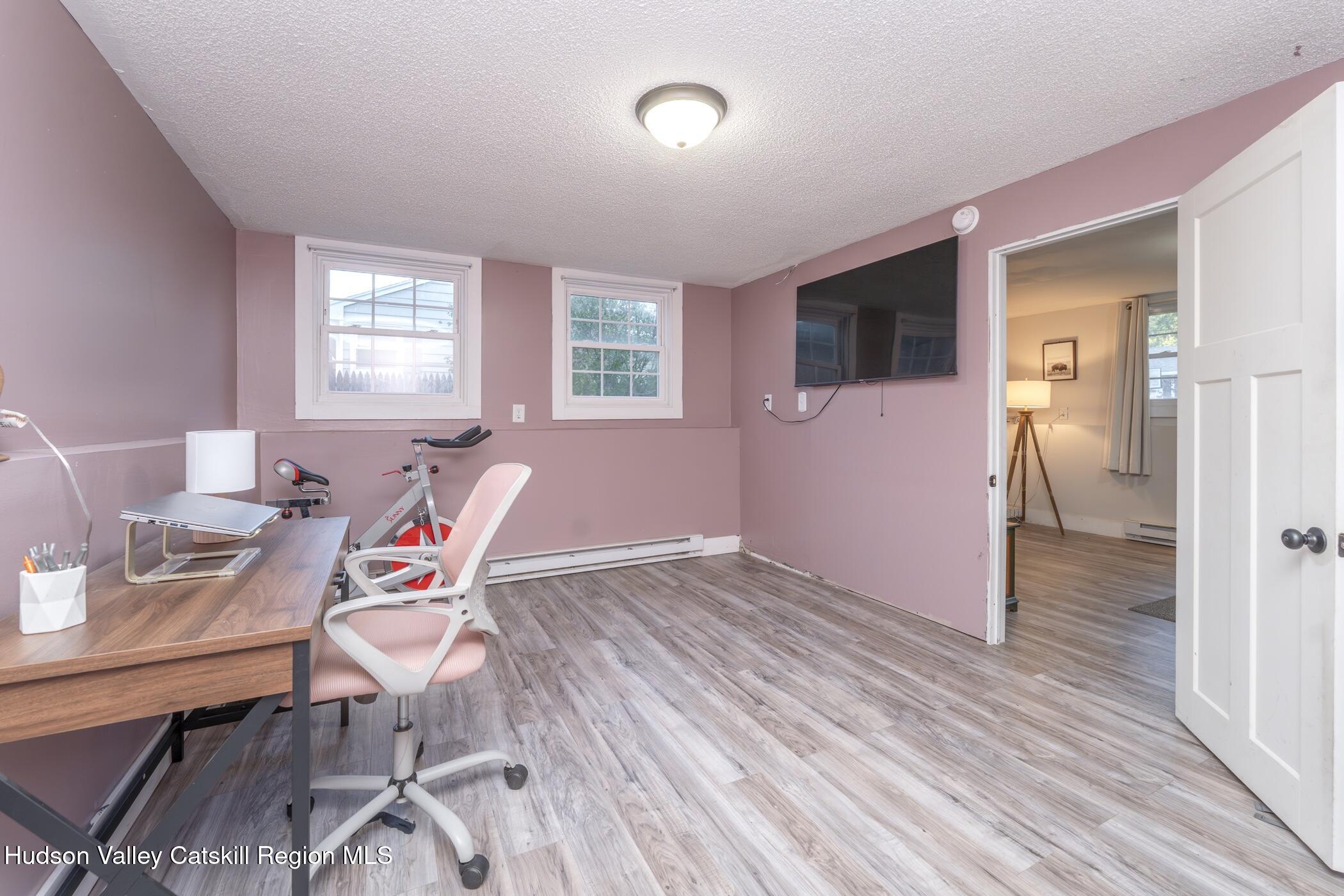 30 Willow Road Saugerties, NY 12477 - Photo 27 of 40 a workspace with wooden floor