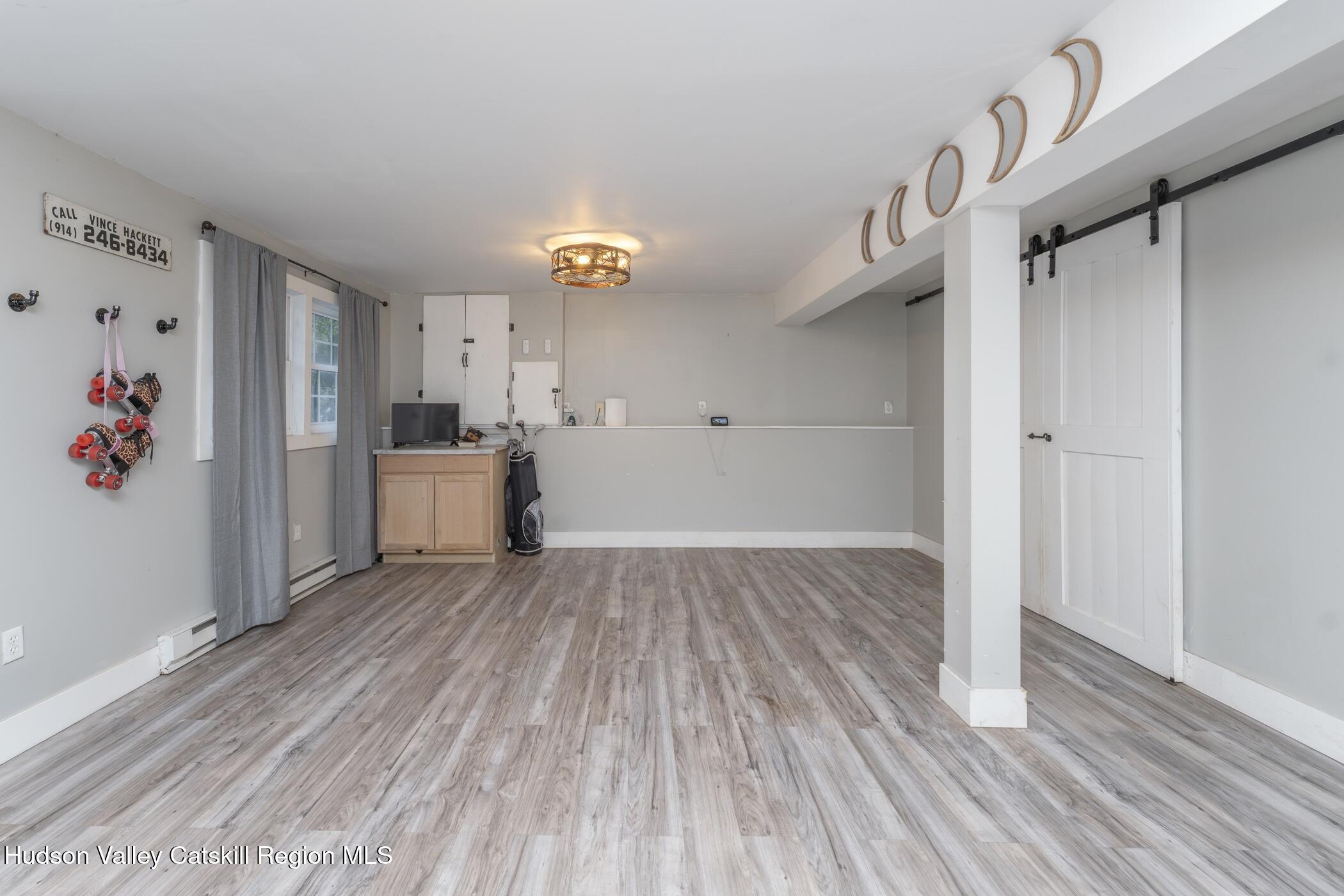 30 Willow Road Saugerties, NY 12477 - Photo 28 of 40 a view of a hardwood floor in a room