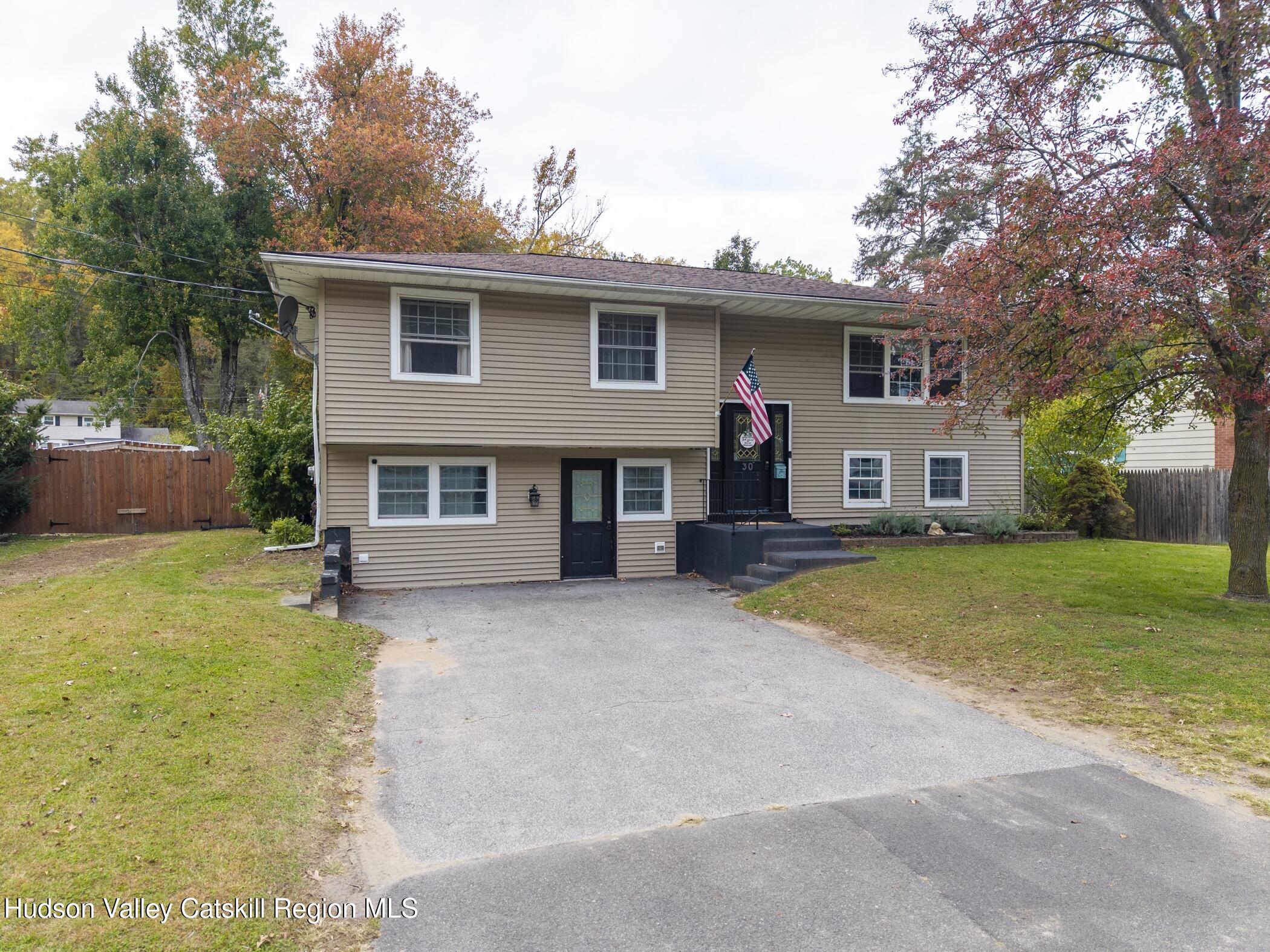 30 Willow Road Saugerties, NY 12477 - Photo 39 of 40 a view of a house with a yard with a large tree