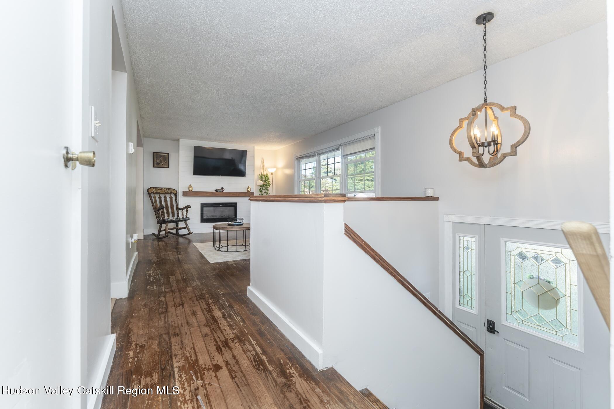 30 Willow Road Saugerties, NY 12477 - Photo 5 of 40 a view of a livingroom with furniture wooden floor windows