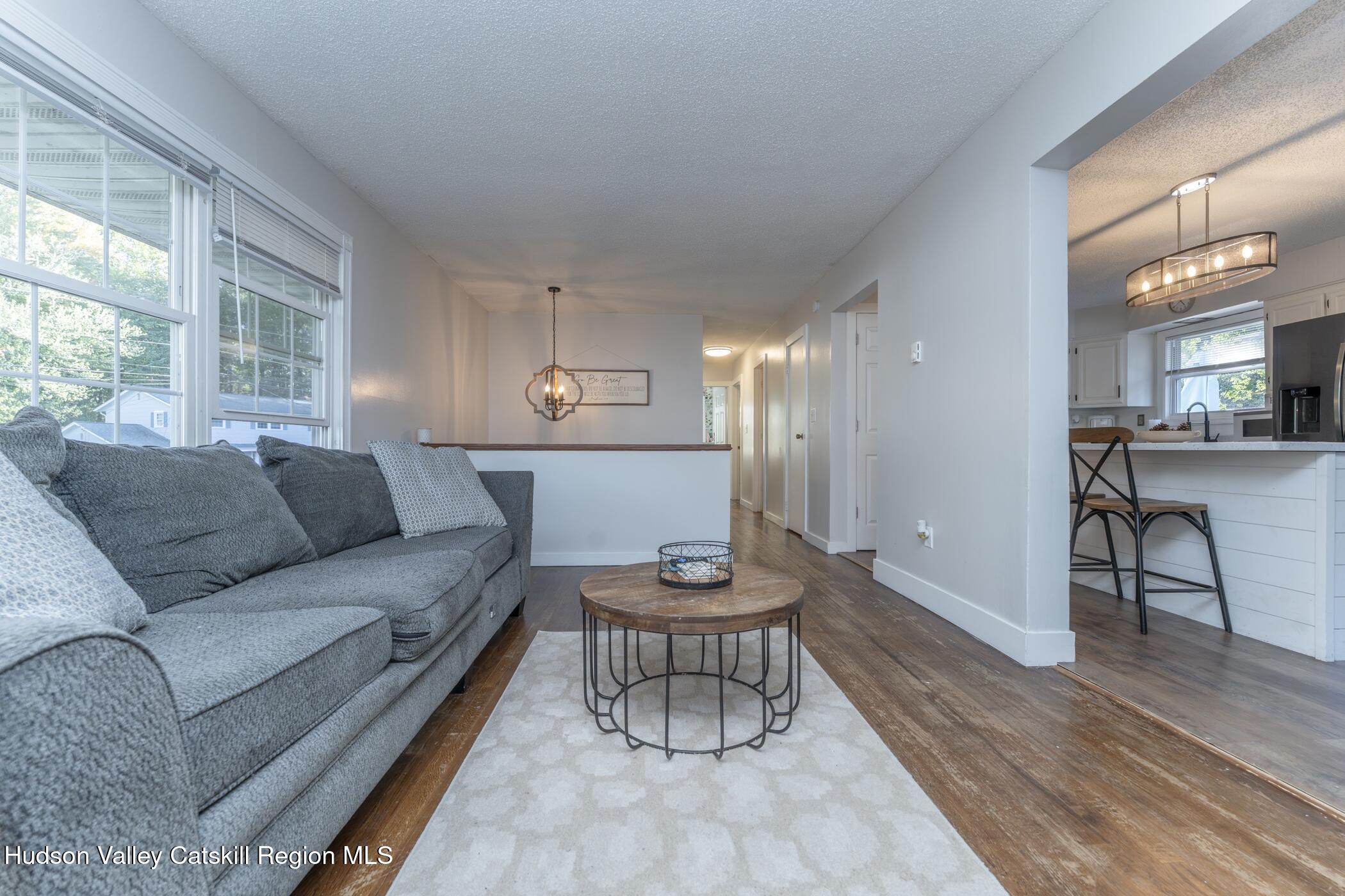 30 Willow Road Saugerties, NY 12477 - Photo 8 of 40 a living room with furniture and a wooden floor