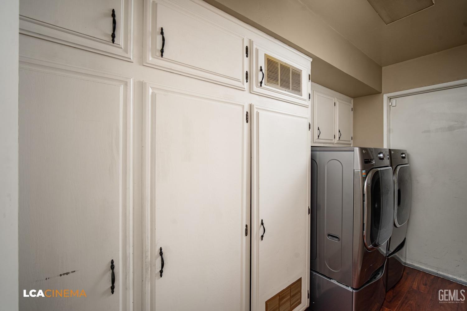 Undisclosed Address Bakersfield, CA 93309 - Photo 11 of 30 a utility room with refrigerator and washer