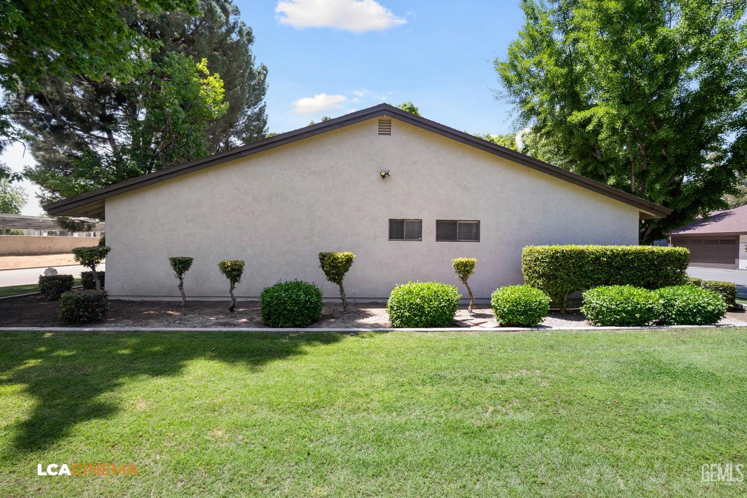 Undisclosed Address Bakersfield, CA 93309 - Photo 21 of 30 a view of a house with backyard and garden