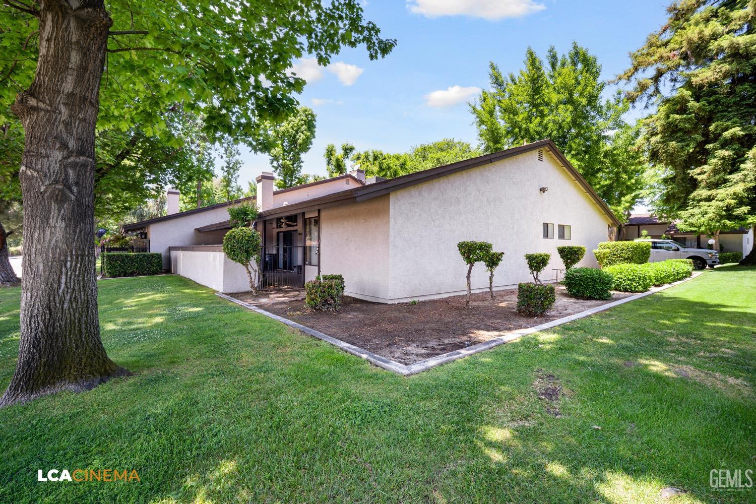 Undisclosed Address Bakersfield, CA 93309 - Photo 22 of 30 a view of an house with backyard space and garden