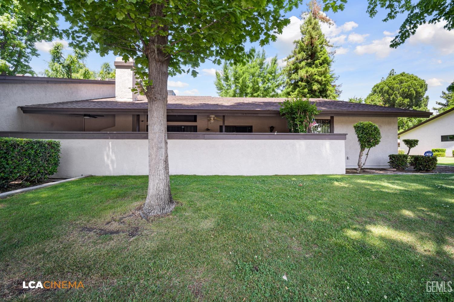 Undisclosed Address Bakersfield, CA 93309 - Photo 23 of 30 a view of a backyard with a garden