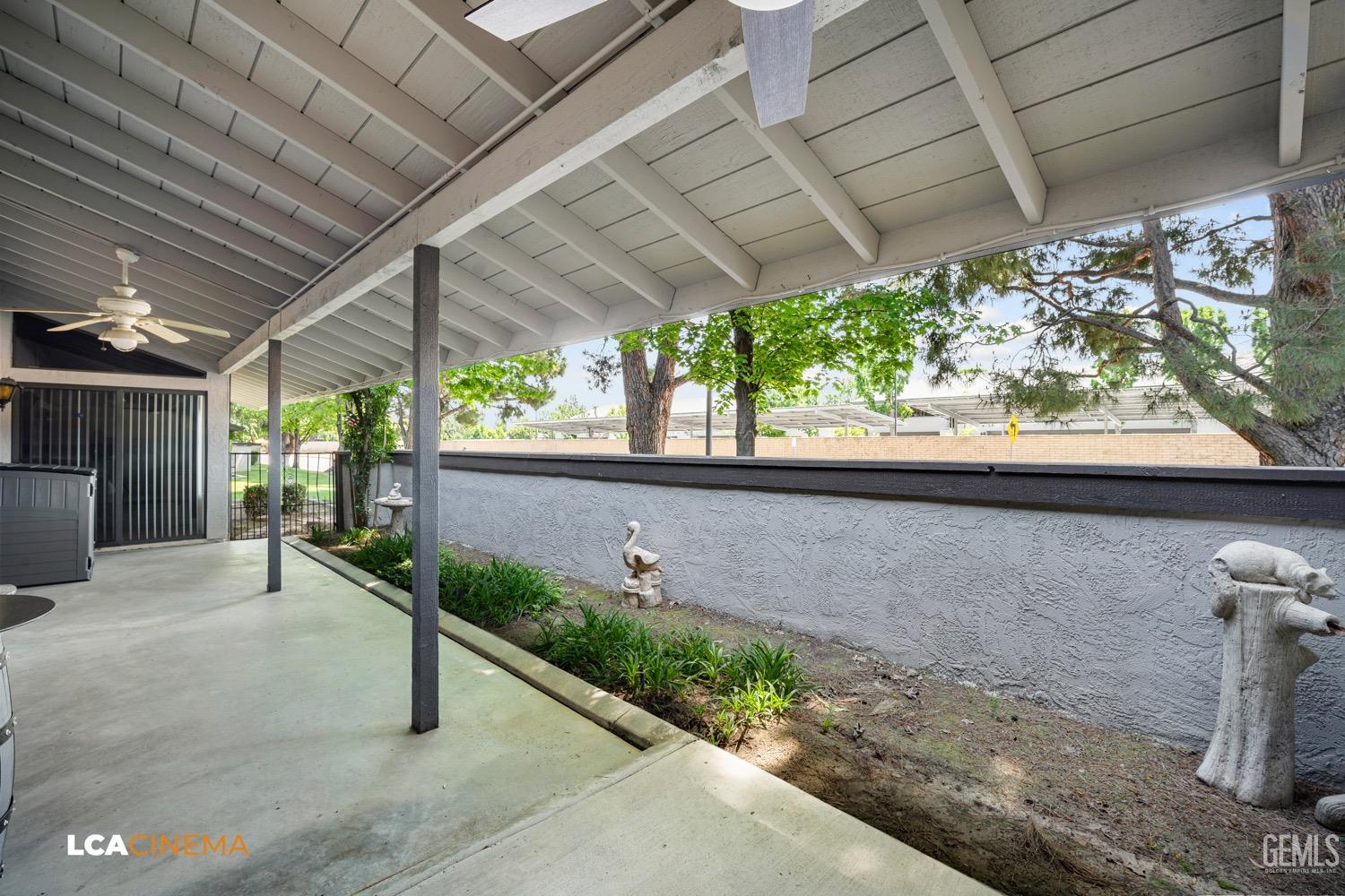 Undisclosed Address Bakersfield, CA 93309 - Photo 24 of 30 a view of a porch with furniture and a yard