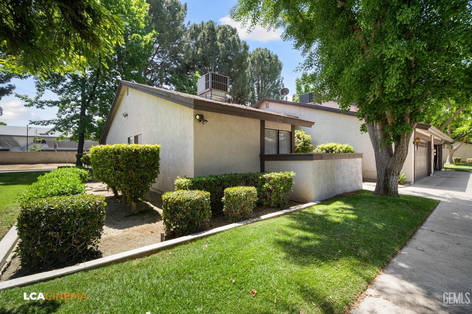 Undisclosed Address Bakersfield, CA 93309 - Photo 3 of 30 a backyard of a house with lots of green space