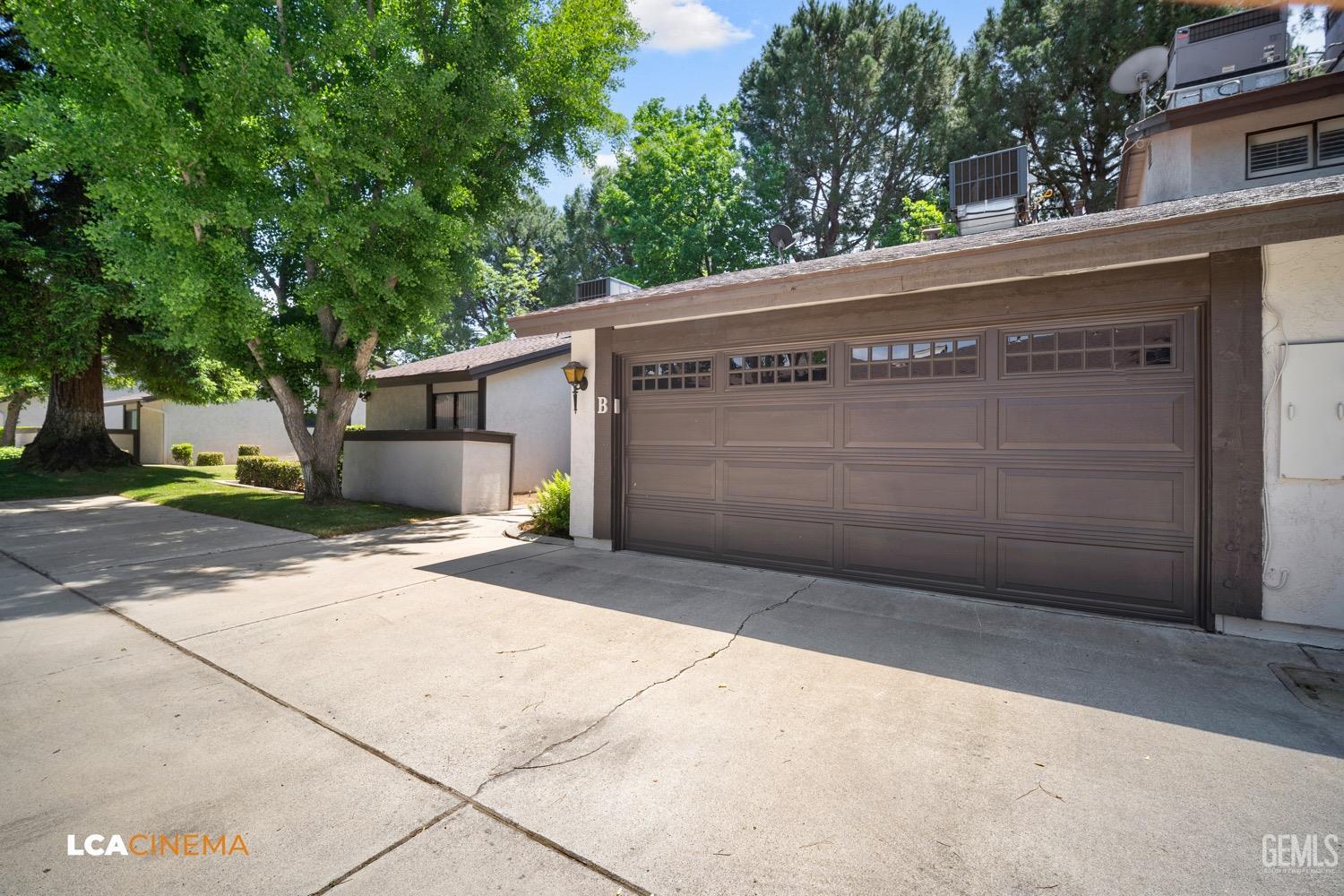 Undisclosed Address Bakersfield, CA 93309 - Photo 4 of 30 a view of a house with a garage