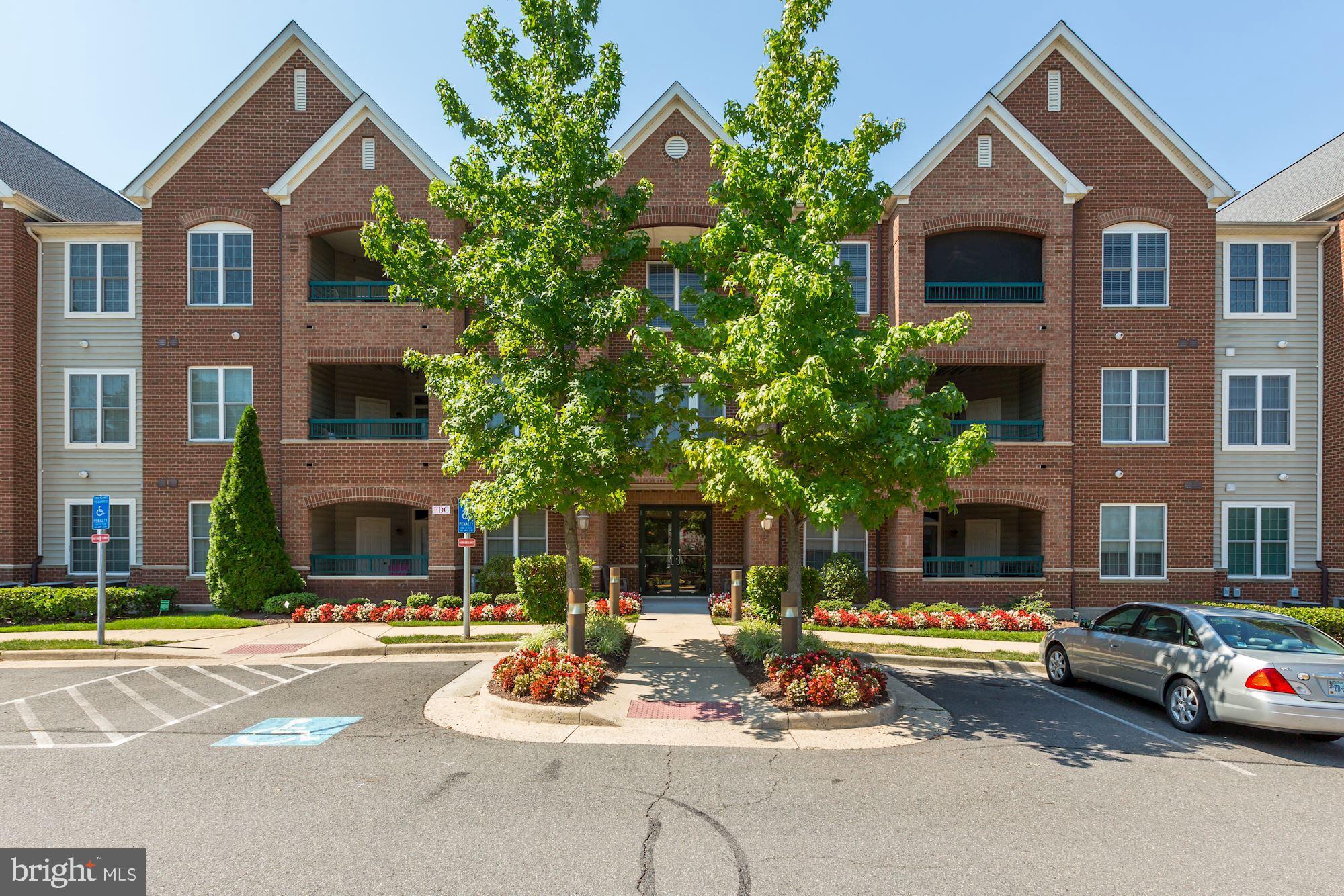 7065 Heritage Hunt Drive, Unit 101 Gainesville, VA 20155 - Photo 1 of 36 Enjoy outdoor maintenance free living.
