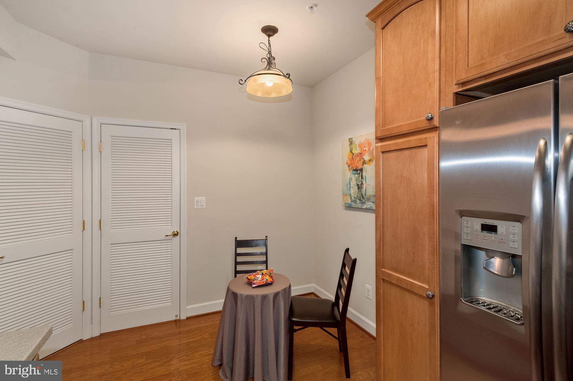 7065 Heritage Hunt Drive, Unit 101 Gainesville, VA 20155 - Photo 12 of 36 Table nook in kitchen.