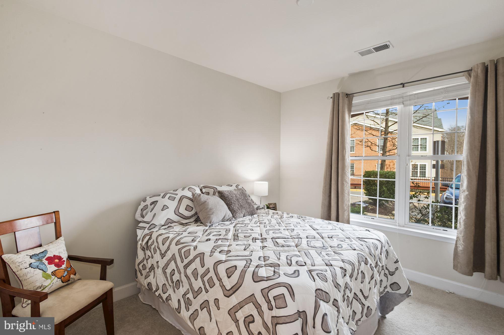 7065 Heritage Hunt Drive, Unit 101 Gainesville, VA 20155 - Photo 21 of 36 Second bedroom is only carpeted area in the condo.