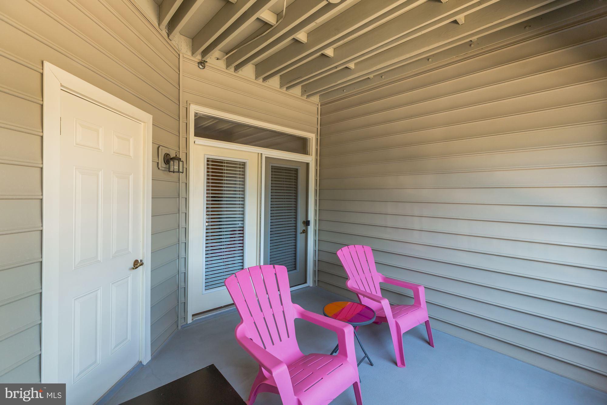 7065 Heritage Hunt Drive, Unit 101 Gainesville, VA 20155 - Photo 28 of 36 Patio closet is where the air handler is located.