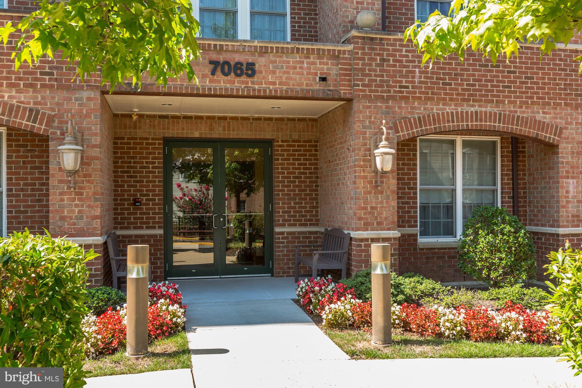 7065 Heritage Hunt Drive, Unit 101 Gainesville, VA 20155 - Photo 4 of 36 Secure building. Key or fob needed for entry.