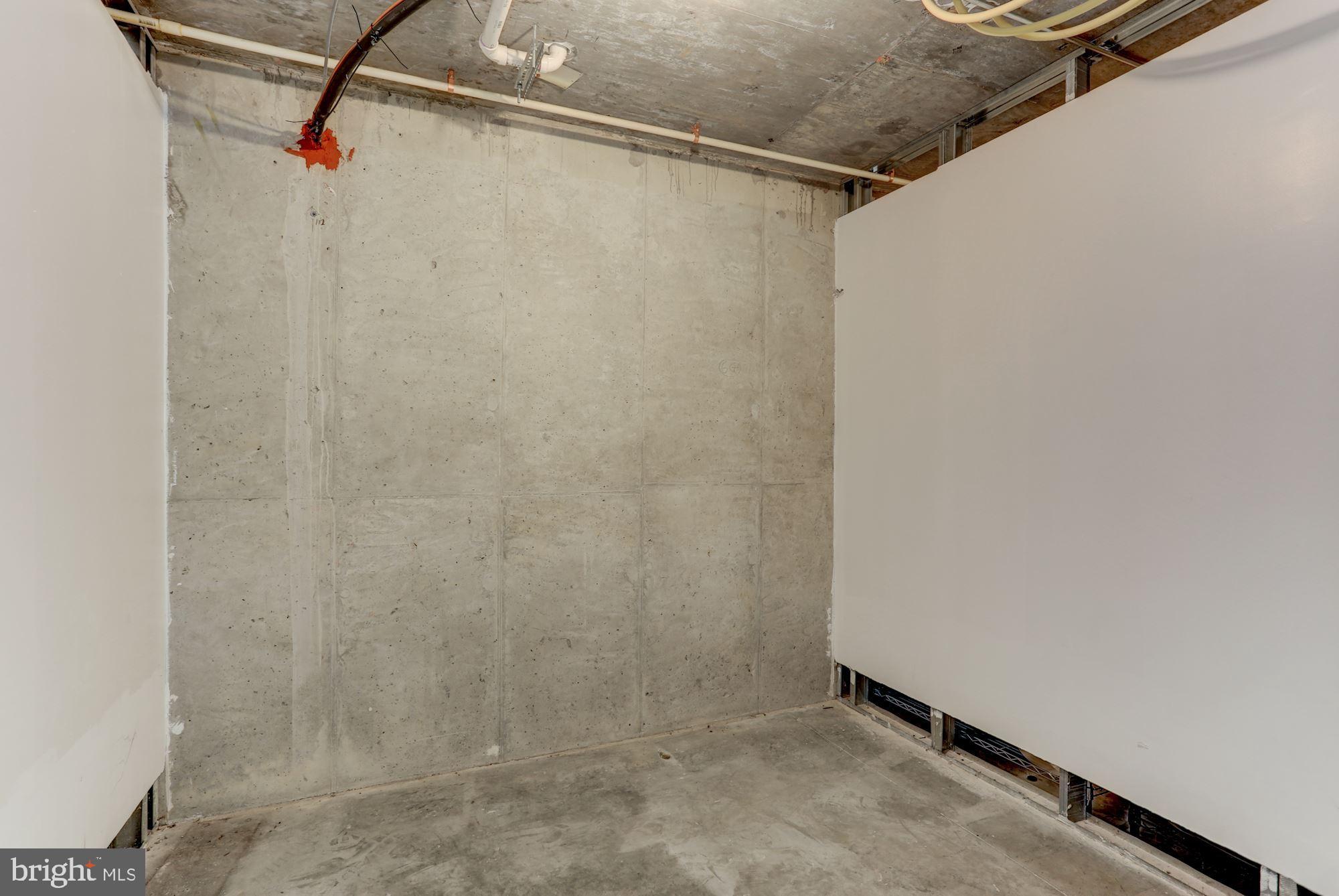 7065 Heritage Hunt Drive, Unit 101 Gainesville, VA 20155 - Photo 30 of 36 Each condo has a storage unit on garage level