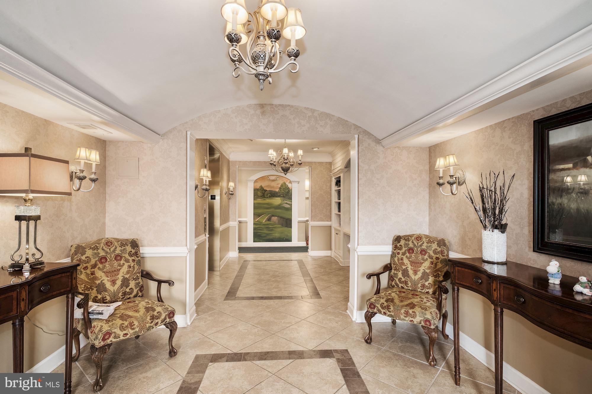 7065 Heritage Hunt Drive, Unit 101 Gainesville, VA 20155 - Photo 5 of 36 Lobby decorated seasonally by residents.