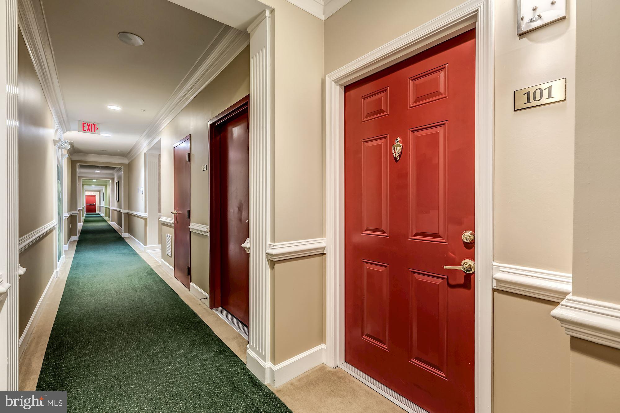 7065 Heritage Hunt Drive, Unit 101 Gainesville, VA 20155 - Photo 7 of 36 Condo entrance around corner from lobby.