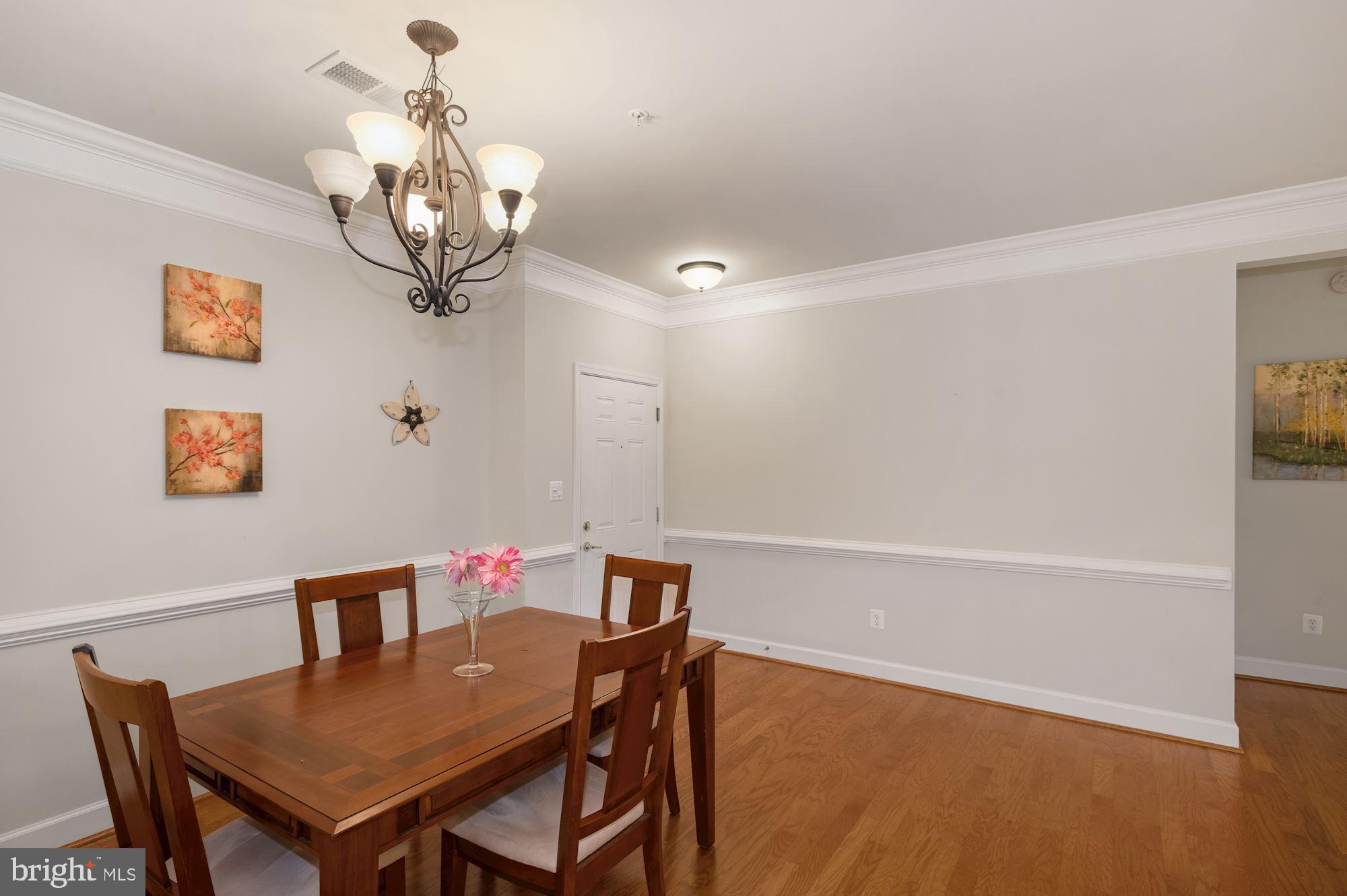 7065 Heritage Hunt Drive, Unit 101 Gainesville, VA 20155 - Photo 9 of 36 Spacious front door entry.