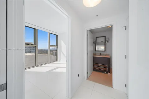 a room with a bench and dryer
