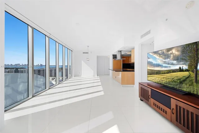 a view of a living room and window