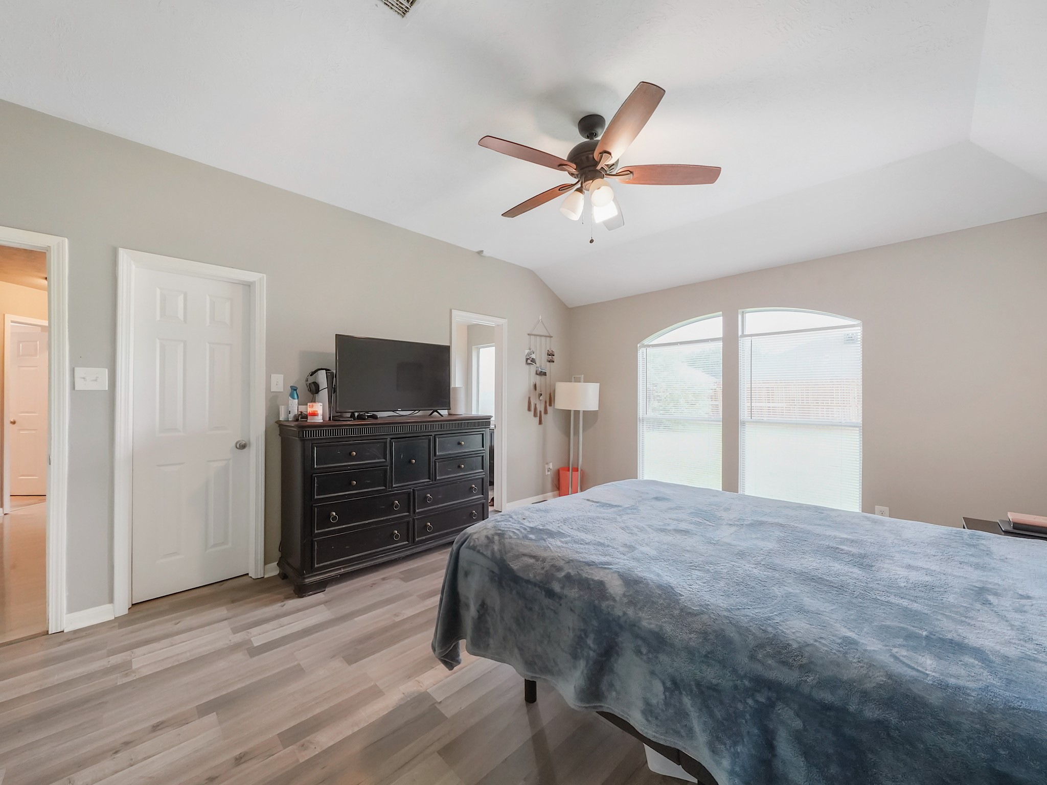 4006 Raspberry Court Dickinson, TX 77539 - Photo 14 of 22 a bedroom with a bed and a flat screen tv