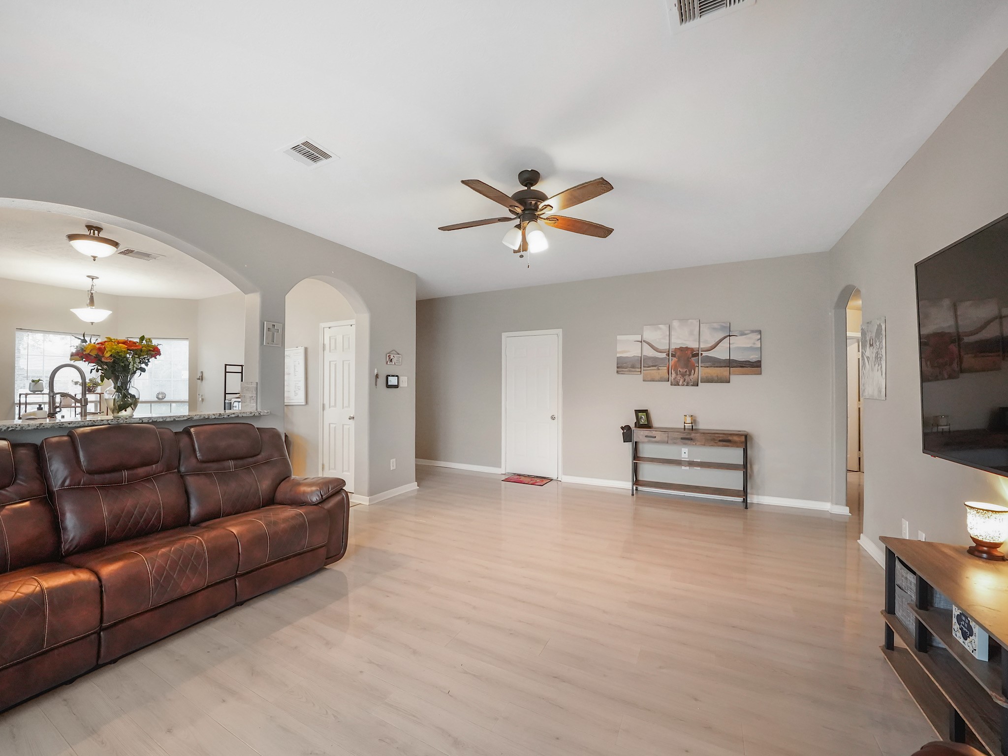 4006 Raspberry Court Dickinson, TX 77539 - Photo 10 of 22 a living room with furniture and a flat screen tv