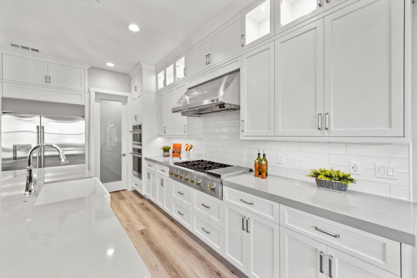 9515 Faria Preserve Parkway San Ramon, CA 94583 - Photo 25 of 84 a kitchen with stainless steel appliances granite countertop a sink a stove and cabinets