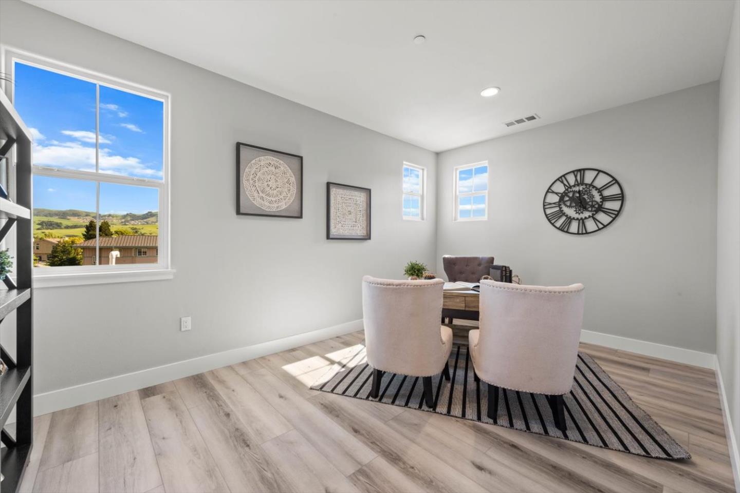 9515 Faria Preserve Parkway San Ramon, CA 94583 - Photo 45 of 84 a view of a dining room with furniture and wooden floor