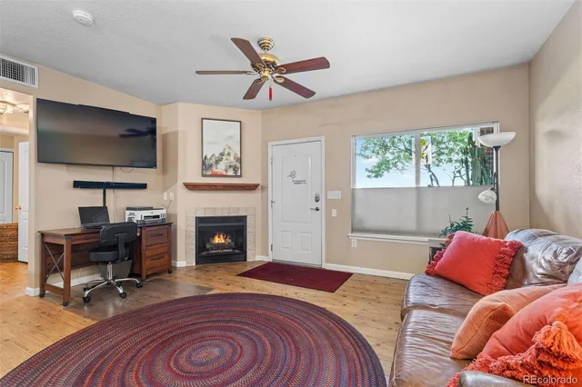 a bedroom with a bed and a fireplace