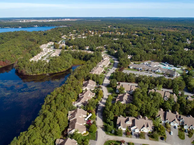 a view of a chairs setting in a backyard