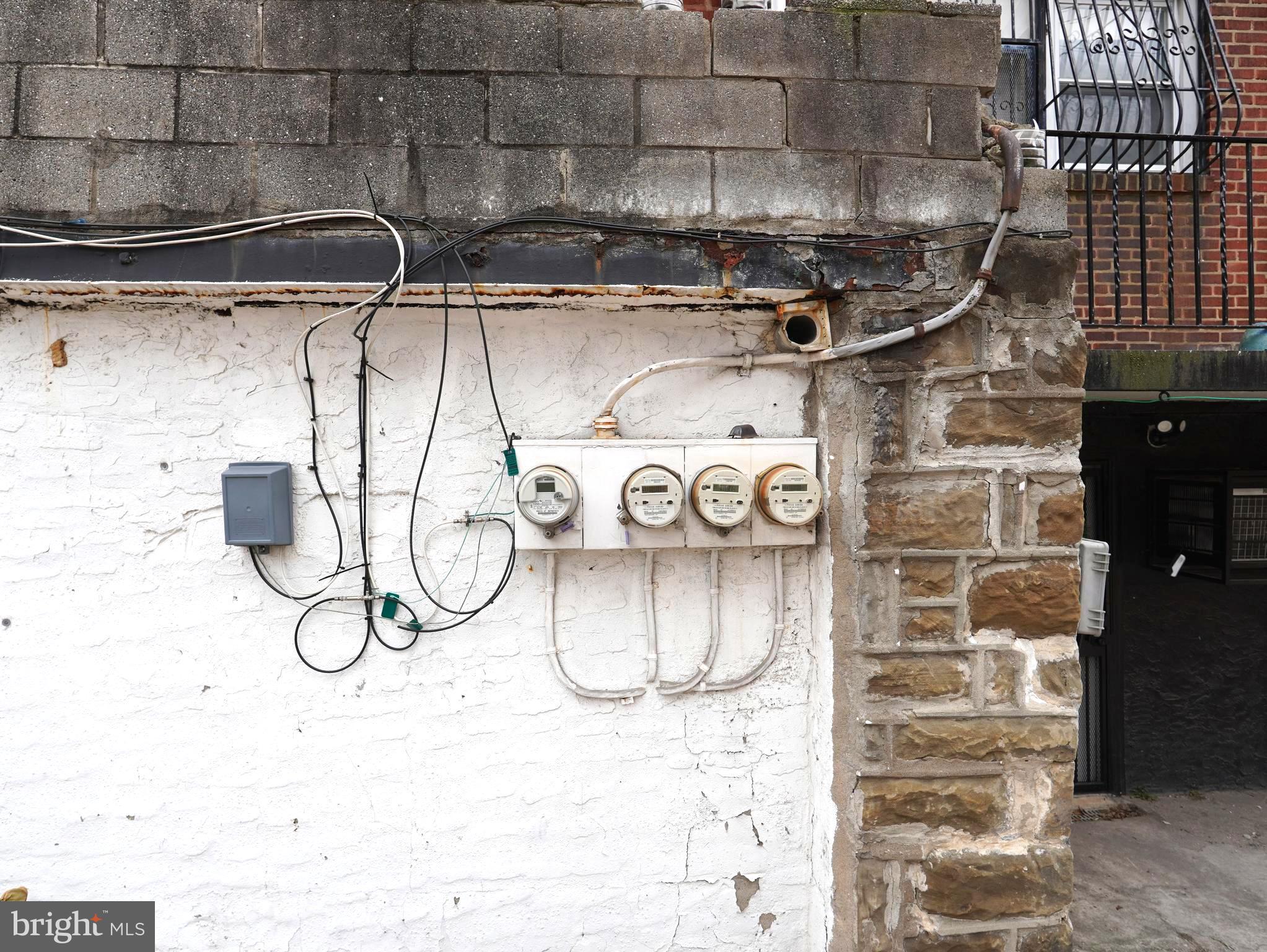 1319 East Lycoming Street Philadelphia, PA 19124 - Photo 4 of 4 a close view of light fixtures and a wooden floor