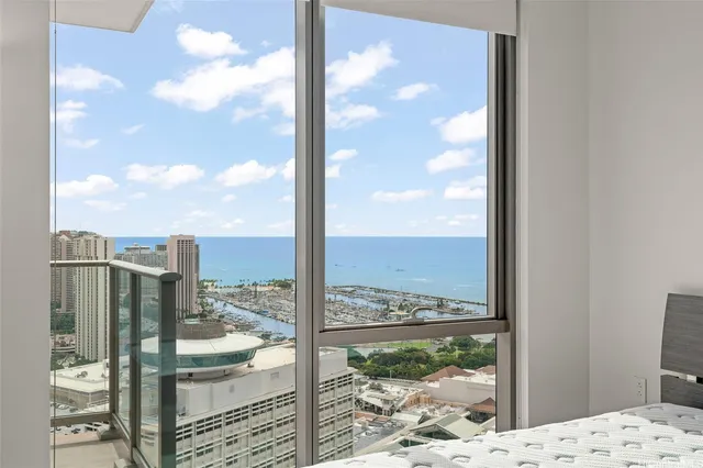 a view of a glass door and porch of the house