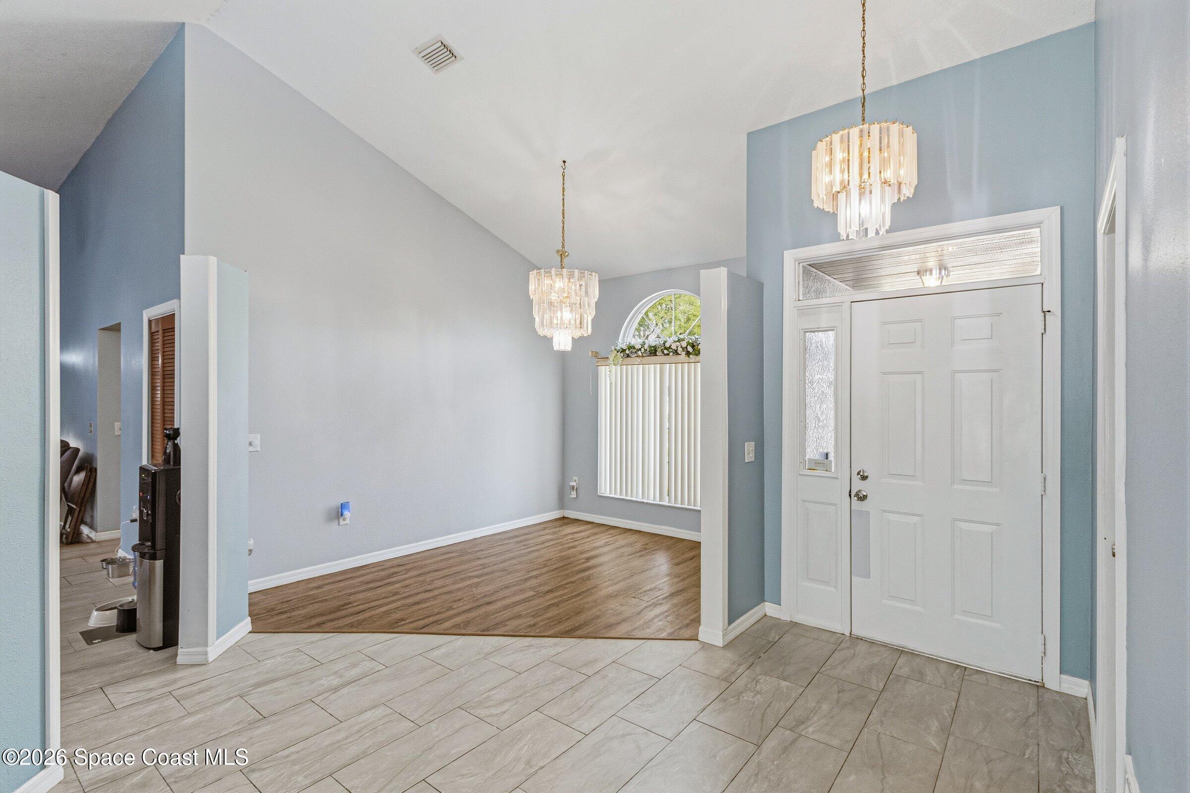 1835 Longleaf Road Cocoa, FL 32926 - Photo 12 of 55 foyer and dining room
