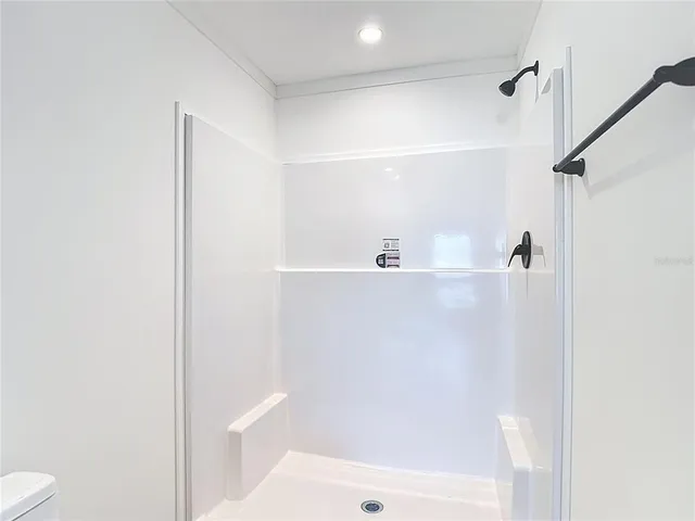 a bathroom with a sink and a shower