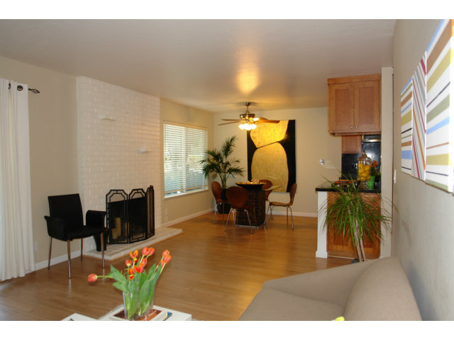 99 East Middlefield Road, Unit 41 Mountain View, CA 94043 - Photo 7 of 24 a living room with furniture and a lamp