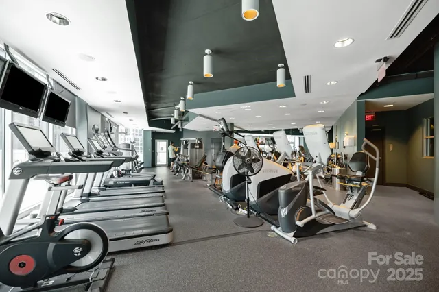 a swimming pool with outdoor seating and yard