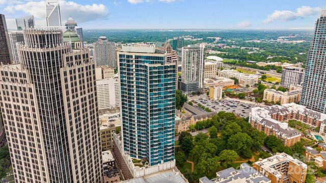 a view of a city with tall buildings