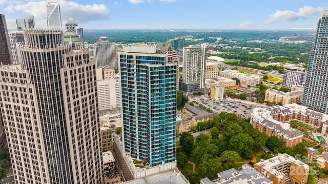 a view of a city with tall buildings