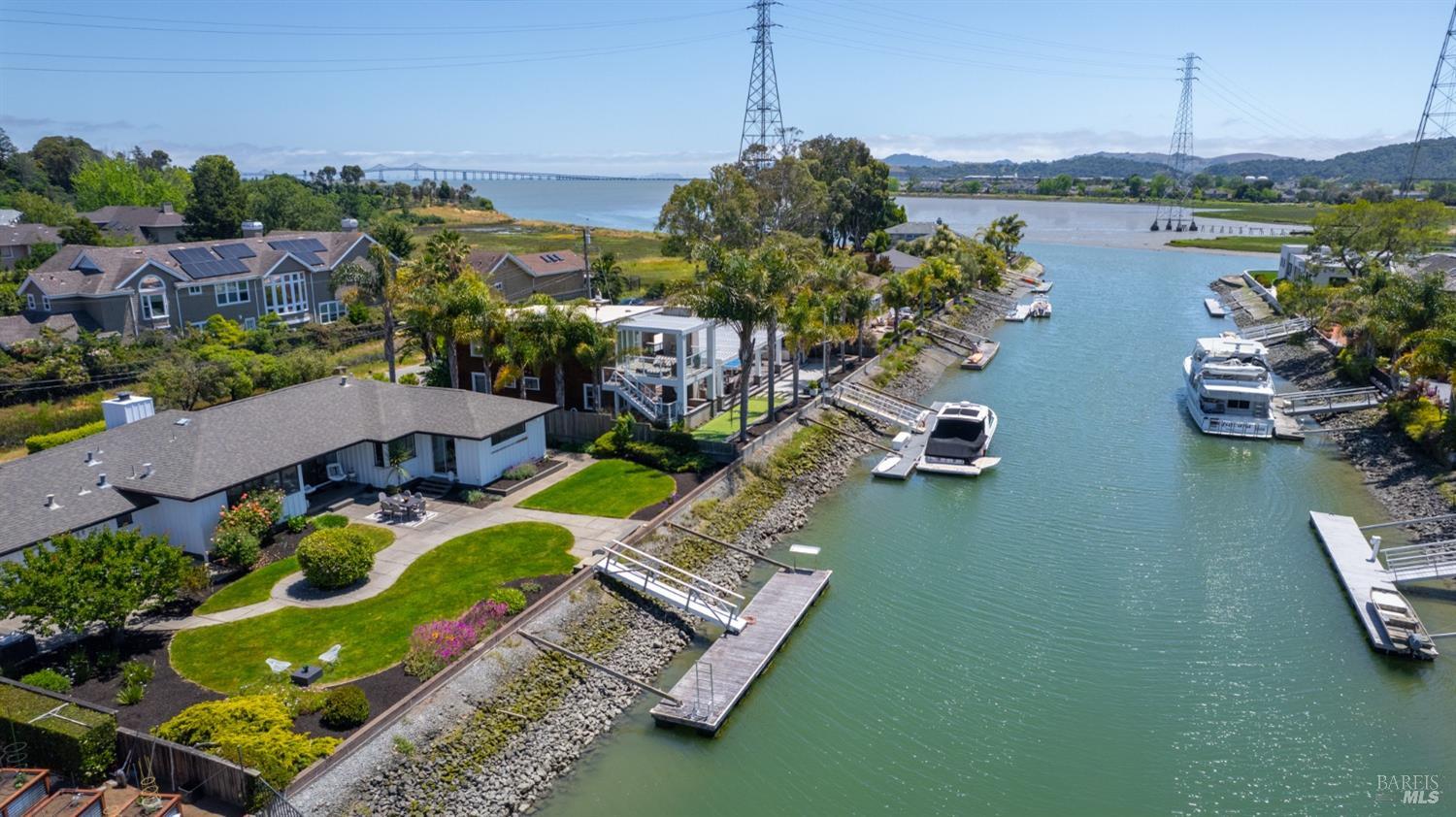 an aerial view of a house with outdoor space lake view and lake view