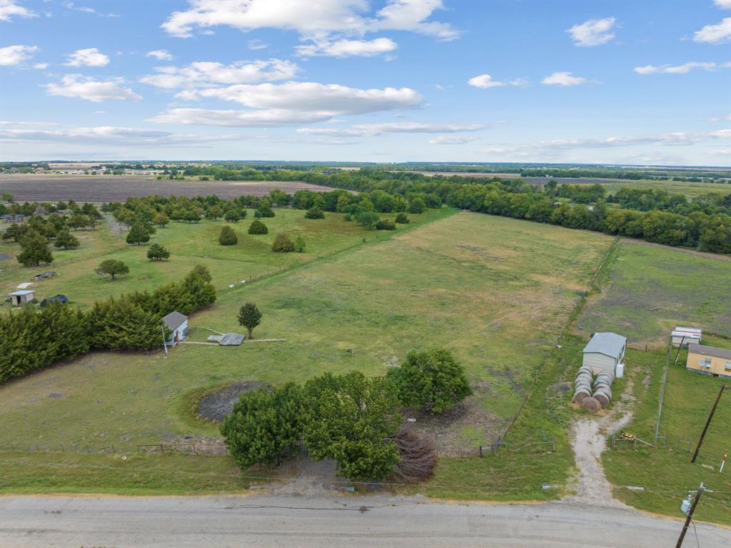 511 Horizon Way Josephine, TX 75173 - Photo 5 of 12 a view of a lake with a yard