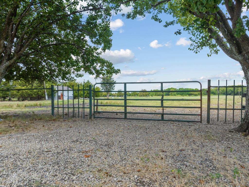511 Horizon Way Josephine, TX 75173 - Photo 6 of 12 a view of a yard with wooden fence
