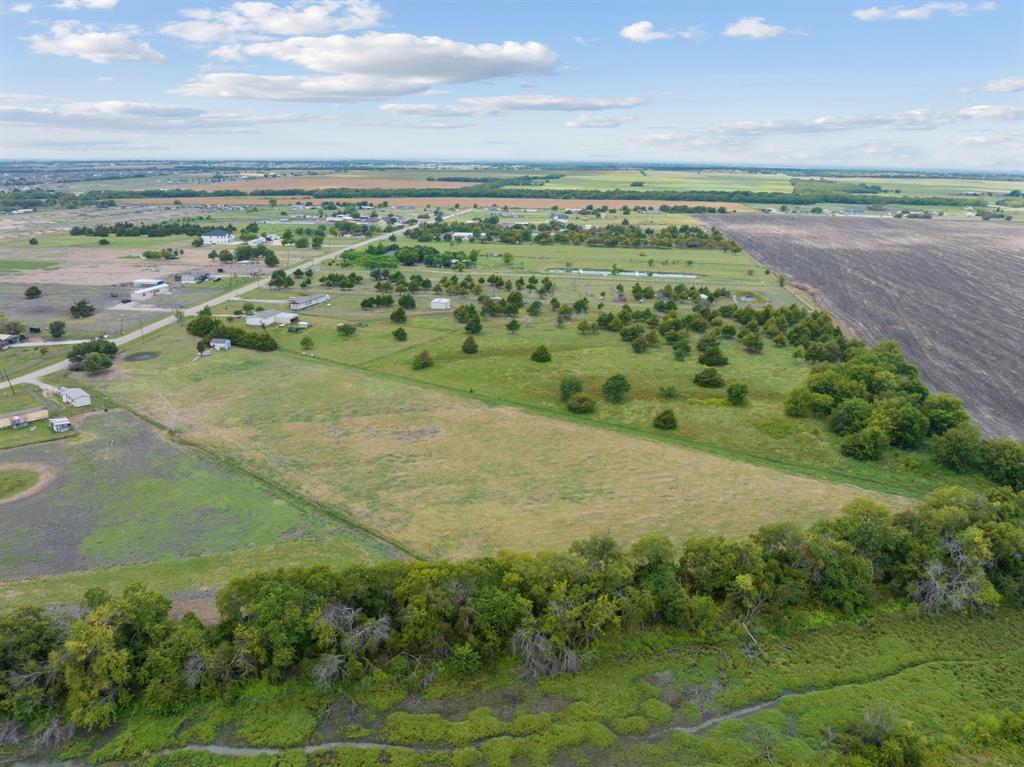 511 Horizon Way Josephine, TX 75173 - Photo 7 of 12 a view of a field with an ocean