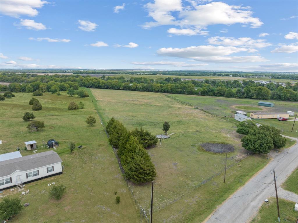 511 Horizon Way Josephine, TX 75173 - Photo 9 of 12 a view of a lake from a yard